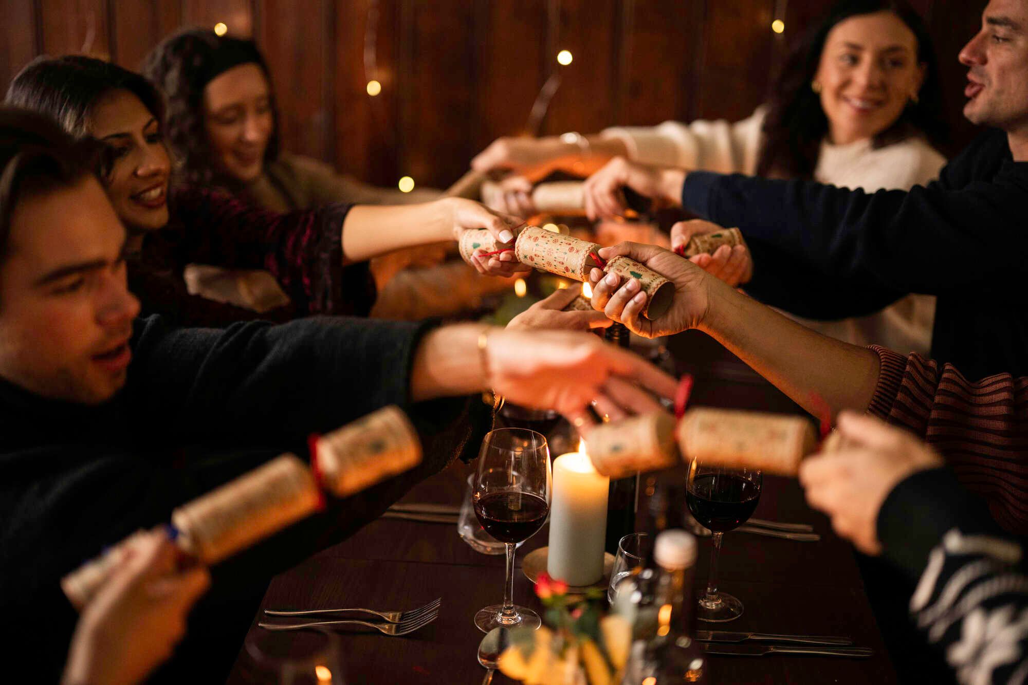 Christmas party pulling crackers